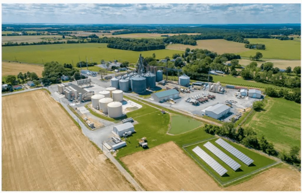 Plant nutrient facility surrounded by trees and green fields
